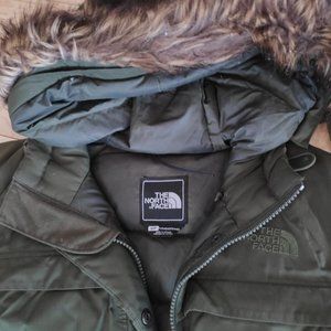 dark green North Face down parka